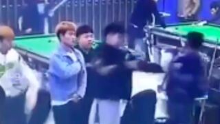 Man gets hacked in the back with a clever by rival gang in China