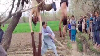 Two Taliban terrorists killed and hung from a tree then beaten by mob in Afghanistan