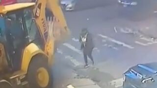 Woman hit and then run over by backhoe in New York