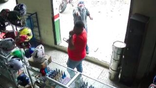 Man gets shot in the head whilst waiting to be served inside a store