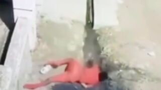 Man crashes his motorcycle into a wall head first with no helmet and walks away