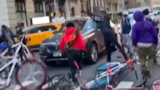 Man gets his car smashed up by Cyclists in New York