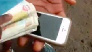 Thief gets brutally beaten for stealing an iPhone and some cash somewhere in Africa