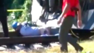 Mans body gets removed from underneath a train after getting run over