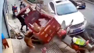 Woman takes out two pedestrians after her car mounts the footpath in China