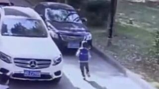 Woman runs over a child in China