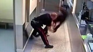 Calgary police officer throws handcuffed woman to the floor face-first