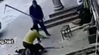 Couple get beaten with a garden hoe by their neighbour