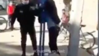 Iranian police torture protester in street until death