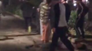 Guy gets stomped in the head and killed after getting jumped by a mob in China