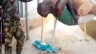 Thief get tied to a contraption over fire and beaten for stealing