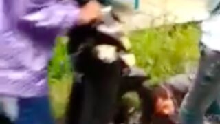 Thief gets caught by a mob of villagers and beaten and run over with a MoPed in Indonesia