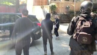 Antifa attack a mans car with his dog inside