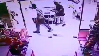 Man blows up a store by dropping a grenade outside of it!