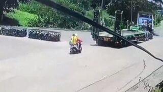 Motorcycle couple crushed to death when flatbed truck driver suddenly reverses over them in Thailand