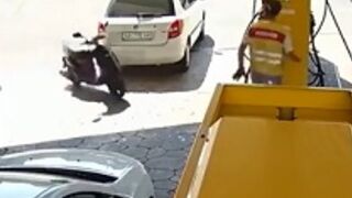 Yikes: Man gets hit at the gas station by a runaway moped