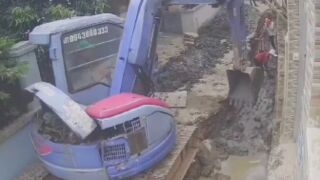 Wall collapses on workers after excavator removes too much dirt