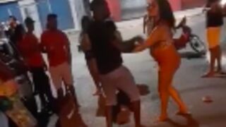 Man knocks a woman out with a left right combo