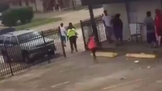 Girl gets knocked down with a metal pipe during an argument