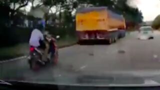 Two motorcyclists get disintegrated after crashing into the back of a parked truck in Indonesia