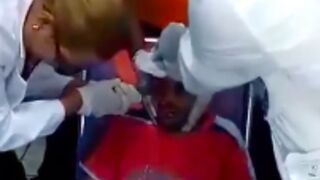 Doctor pulls a knife from a mans eye socket after an attack