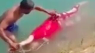 Man tries to steal money from a dead womans corpse while it was floating down the river but she had nothing
