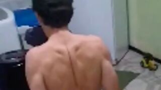 Guy gets lashed with a cable across his back by traffickers over a drug debt in Brazil