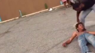 Guy gets beaten hard in front of his baby momma after getting into a street beef