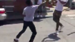 Two guys get into a street fight in Philly!