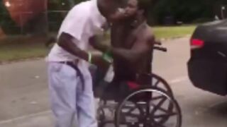 Man gets beat up bad by a dude in a wheelchair!