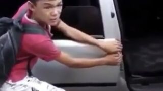 Thief gets his hand slammed in a car door!