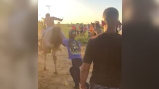 Man kicked in the face after standing behind a horse!