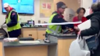 Woman goes crazy at the post office and tears it down!