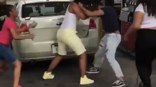 Two women get into a fight at a gas station and her young daughter got involved