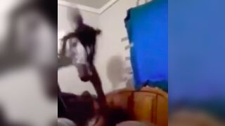 Woman gets repeatedly beaten over the head with a frying pan after she was caught in bed with her man!