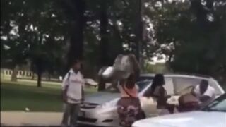 Man gets jumped by a bunch of women with weapons!