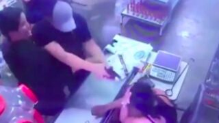 Man tries to kill his his wife at her workplace but the gun jamms on em!