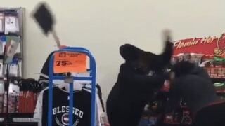 Woman gets jumped and beaten with a snow shovel inside a store!