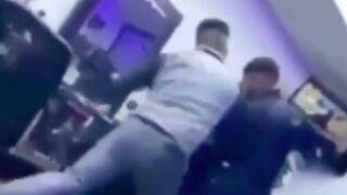Guy gets knocked out while sitting in the barbers chair!