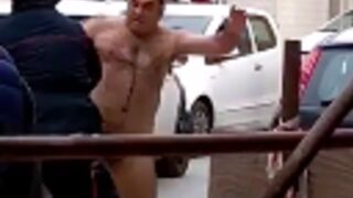 Naked man fights police in italy!