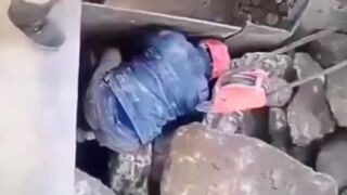 Man gets turned into mince meat after getting grinded by a rock grinder!