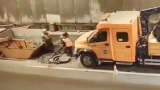 Construction workers get crushed against a skip!