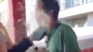 Man gets covered in gasoline and set on fire in hong kong!