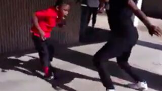 Mother goes to her sons school, grabs him from the lunch room and beats him for disrespecting his teacher!