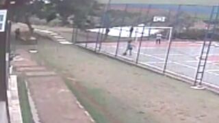 Car crashes into soccer ground where kids are playing!