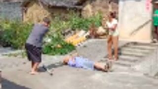 Old man gets hit over the face/head with tree branch in china!