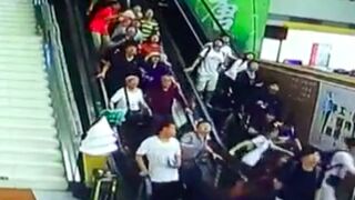 Ceiling collapses while people go down the escalator!