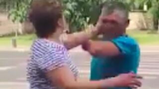 Angry woman slaps up her husband in the street!