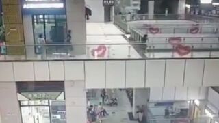 Final Destination: Woman gets swept away by a load of water from above at a shopping mall!