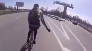 Cyclists pay the price for riding on the freeway!